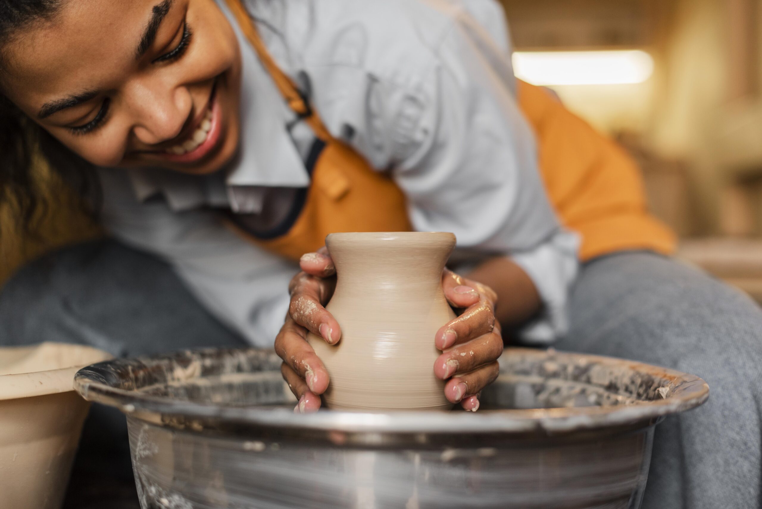 close-up-woman-doing-pottery